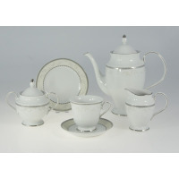 Porcelanowy garnitur do kawy Ćmielów B601 Astra dla 12 osób. Zestaw z białej porcelany ze srebrnym zdobieniem, obejmujący dzbanek, cukiernicę, mlecznik oraz