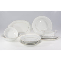 Biały serwis obiadowy Chodzież Iwona B014 dla 12 osób. Zestaw 44 części z porcelany o karbowanej fakturze, zdobiony delikatną złotą linią na krawędziach naczyń.