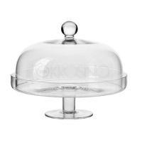 Szklana patera z kloszem Elite marki Krosno Glass S.A. na nóżce, wykonana z przezroczystego szkła. Na środku widoczne logo Krosno 1923. Widok na produkt z