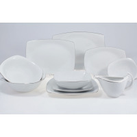 Serwis obiadowy Chodzież 9718 Akcent Platynowa linia dla 12 osób. Białe porcelanowe naczynia o nowoczesnym, kwadratowym kształcie z delikatnym, srebrnym