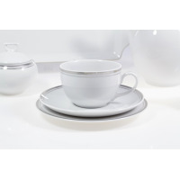 Biały zestaw kawowy Chodzież YVONNE G238. Filiżanka ze spodkiem i talerzykiem deserowym, ozdobione subtelną srebrną linią. Elegancka porcelana na 12 osób.