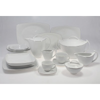 Serwis obiadowo-kawowy Chodzież 9718 AKCENT Platynowa linia dla 12 osób. Biała porcelana o nowoczesnym, kwadratowym kształcie z eleganckim, srebrnym zdobieniem.