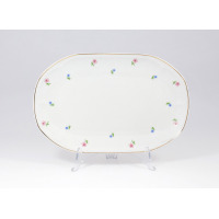 Owalny półmisek Lubiana Jastra 28 cm z białej porcelany, zdobiony delikatnym motywem drobnych różowych i niebieskich kwiatków oraz złotą linią na krawędzi.