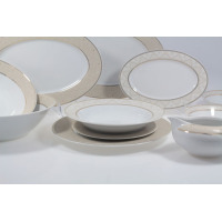 Elegancki serwis obiadowy Chodzież G620 YVONNE dla 12 osób. Biała porcelana z subtelnym, beżowym wzorem geometrycznym i złotymi akcentami na półmiskach oraz