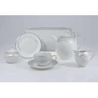 Elegancki zestaw kawowy Chodzież E615 Yvonne dla 12 osób. Biała porcelana z subtelnym srebrnym zdobieniem, obejmująca dzbanek, cukiernicę, mlecznik, filiżankę