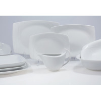 Elegancki serwis obiadowy Chodzież G727 Akcent dla 12 osób. Białe, porcelanowe naczynia o nowoczesnym, prostokątnym kształcie z subtelnym roślinnym tłoczeniem.