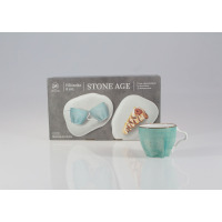 Zestaw 6 filiżanek Lubiana Stone Age 100 ml w kolorze morskim. Opakowanie z grafiką naczyń i ciasta oraz pojedyncza turkusowa filiżanka z brązowym rantem.