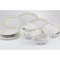 Serwis obiadowy Ćmielów Bolero Vienna Złota dla 6 osób. Biała porcelana z eleganckim złotym zdobieniem, obejmująca wazę, sosjerkę, talerze i półmiski na białym