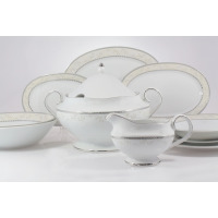 Elegancki serwis obiadowy Ćmielów B601 Astra dla 6 osób. Biała porcelana z subtelnym roślinnym motywem i srebrnym zdobieniem, w tym waza oraz sosjerka na