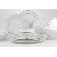 Serwis obiadowy dla 6 osób Ćmielów B601 ASTRA. Biała porcelana ze srebrnym zdobieniem i delikatnym motywem roślinnym. Zestaw naczyń z sosjerką i wazą na białym