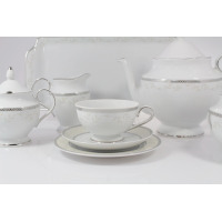 Zestaw do herbaty Ćmielów B601 Astra Marzenie platynowe z filiżanką na spodku, dzbankiem, mlecznikiem i cukiernicą. Biała porcelana ze srebrnym zdobieniem i