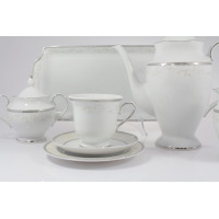 Zestaw do kawy Ćmielów B601 Astra Marzenie platynowe: biała porcelana z delikatnym roślinnym motywem i srebrnym wykończeniem, widoczna taca, dzbanek