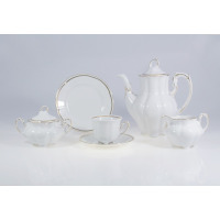 Elegancki zestaw do kawy Ćmielów E337 Bolero dla 6 osób. Biała porcelana o falistym kształcie z subtelnym złotym zdobieniem na krawędziach dzbanka, cukiernicy