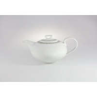 Biały porcelanowy czajnik Chodzież G682 Yvonne Złoty Miraż o pojemności 1,10 l. Naczynie o obłym kształcie z delikatnym, geometrycznym złotym zdobieniem przy