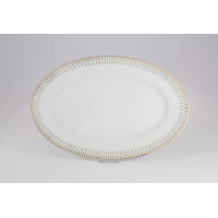 Biały porcelanowy półmisek Chodzież 33 cm z serii G682 YVONNE Złoty Miraż. Owalne naczynie zdobi elegancki, geometryczny wzór w kolorze złota na obrzeżach.