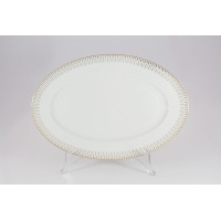 Biały półmisek Chodzież 36 cm z serii G682 Yvonne Złoty Miraż. Owalne naczynie z porcelany zdobione na obrzeżach eleganckim, geometrycznym wzorem w kolorze