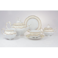 Zestaw do herbaty Ćmielów E363 Bolero dla 6 osób. Biała porcelana z kremowym zdobieniem i złotym ornamentem, obejmująca dzbanek, cukiernicę, mlecznik oraz