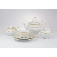 Zestaw do herbaty Ćmielów E363 Bolero dla 6 osób. Biała porcelana z subtelnym kremowym wzorem i złotym zdobieniem, obejmująca dzbanek, cukiernicę, mlecznik