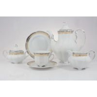 Zestaw do kawy Ćmielów E551 Bolero Princess: biała porcelana ze złotym i srebrnym zdobieniem. Komplet zawiera dzbanek, cukiernicę, mlecznik, filiżankę i