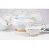 Serwis obiadowy Ćmielów G684 Astra Królewski błękit. Zestaw 25 części z białej porcelany ze złotymi brzegami i delikatnym, niebieskim ornamentem w stylu