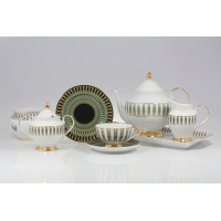 Elegancki zestaw do herbaty Ćmielów G413 ASTRA India dla 6 osób. Biała porcelana ze złotymi akcentami i geometrycznym wzorem w odcieniach zieleni na tacy