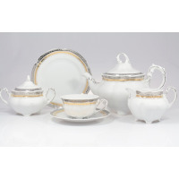 Zestaw do herbaty Ćmielów E551 Bolero Princess dla 6 osób. Biała porcelana ze złotym i srebrnym zdobieniem, obejmująca dzbanek, cukiernicę, mlecznik oraz