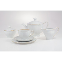 Zestaw do herbaty Ćmielów G311 Oktawa dla 6 osób. Biała porcelana z delikatnym żłobkowaniem i złotym wykończeniem, obejmująca dzbanek, cukiernicę, mlecznik
