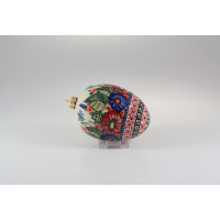 Ceramiczna ozdoba choinkowa Bolesławiec 149AR w kształcie jaja o wysokości 11 cm. Ręcznie malowany wzór GU-1808 z motywami kwiatowymi, liśćmi i geometrycznym