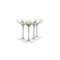 Zestaw czterech eleganckich kieliszków do wódki Celebration marki Krosno Glass S.A. o pojemności 55 ml. Przezroczyste szkło o smukłej nóżce i szerokiej czaszy.