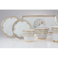 Zestaw kawowy Ćmielów G670 Margaret dla 6 osób. Biała porcelana ze złotym zdobieniem i subtelnym ornamentem roślinnym, obejmująca filiżankę, spodek, cukiernicę