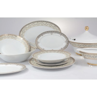 Zestaw obiadowy Ćmielów G670 Margaret dla 6 osób. Biała porcelana ze złotym zdobieniem i roślinnym ornamentem, obejmująca talerze, półmiski oraz wazę z