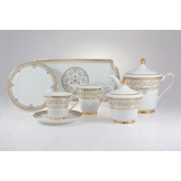 Elegancki zestaw obiadowy Ćmielów G670 Margaret dla 6 osób. Biała porcelana ze złotym zdobieniem i subtelnym ornamentem roślinnym, obejmująca filiżankę