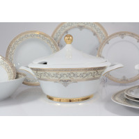 Elegancka waza z zestawu obiadowego Ćmielów G670 Margaret dla 6 osób. Biała porcelana ze złotym wykończeniem i subtelnym roślinnym ornamentem, wyeksponowana z
