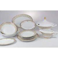 Zestaw obiadowy Ćmielów G670 MARGARET dla 6 osób. Biała porcelana z eleganckim, złotym zdobieniem na brzegach, obejmująca wazę, półmiski, sosjerkę i talerze.