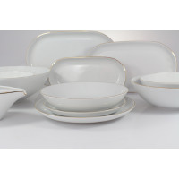 Zestaw obiadowy Chodzież B326 City Złote dla 12 osób. Biała porcelana o minimalistycznym designie z delikatną złotą linią na krawędziach, wyeksponowana w