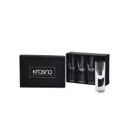 Zestaw czterech szklanych kieliszków do wódki Krosno Gotic 30 ml w czarnym pudełku z logo marki i napisem Brilliance in Glass Since 1923. Jeden kieliszek stoi