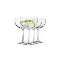 Zestaw czterech eleganckich kieliszków do wody Roma marki Krosno Glass o pojemności 470 ml. Jeden z nich wypełniony jest lodem, cytryną i jagodami jałowca.