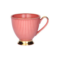 Filiżanka Dalia Ceglasta marki Chodzież o pojemności 250 ml. Eleganckie naczynie w kolorze ceglastym z pionowym żłobkowaniem, złotym rantem i złotą podstawą.