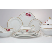 Serwis obiadowy Ćmielów G529 ASTRA Akwarela dla 6 osób. Zestaw 25 części z białej porcelany zdobiony złotą kratką i motywem różowych kwiatów na tle naczyń.