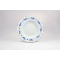 Talerz głęboki 22,5 cm Ćmielów G540 ALASKA z porcelany o falistym brzegu, zdobiony delikatnym, niebieskim motywem kwiatowym na białym tle ze złotą linią na