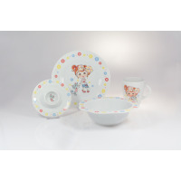 Zestaw naczyń dla dzieci Ćmielów Calineczka W009: biała porcelana z motywem dziewczynki i kotka, obejmująca talerz, miseczkę, kubek oraz podstawkę na jajko.