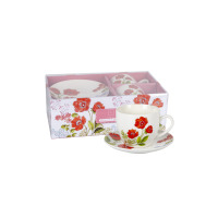 Zestaw dwóch filiżanek 250 ml ze spodkami marki Kaczyński Sp.J. w ozdobnym pudełku. Biała porcelana z motywem czerwonych maków, widoczna jedna filiżanka na