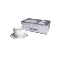 Zestaw dwóch filiżanek 250 ml ze spodkami marki Kaczyński Sp.J. w kropki. Jedna filiżanka stoi na spodku, pozostałe w opakowaniu z napisem Livello 4pcs Cup &