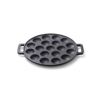 Żeliwna patelnia do mini pancaków Skottsberg o średnicy 24 cm. Okrągłe naczynie z 19 wgłębieniami, dwiema bocznymi rączkami i czarną, chropowatą powierzchnią.