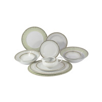 Serwis obiadowy Chodzież H115 Yvonne dla 12 osób. Komplet 44 części z białej porcelany zdobiony delikatnym zielonym wzorem z subtelnymi detalami na krawędziach.