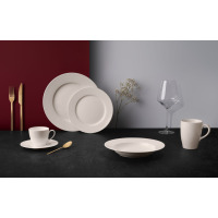Zestaw naczyń Modern Ivory od Gerlach na 6 osób: eleganckie, kremowe talerze, filiżanka ze spodkiem, głęboki talerz, kubek, kieliszek oraz złote sztućce na