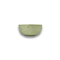 Limonkowa miska 16 cm z serii KD00 HANAMI marki Lubiana. Ceramiczna salaterka o zaokrąglonym kształcie z wypukłym, roślinnym wzorem kwiatów i liści.