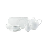 Biały garnitur do kawy Chodzież H109 Yvonne. Zestaw porcelany z delikatnym tłoczonym wzorem, obejmujący dzbanek, cukiernicę, mlecznik, filiżankę ze spodkiem i