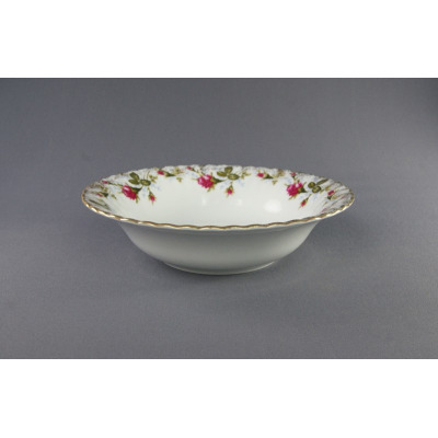 Okrągła salaterka Chodzież Iwona B013 o średnicy 23 cm z białej porcelany, zdobiona delikatnym motywem róż i złotym wykończeniem krawędzi, widok z profilu.