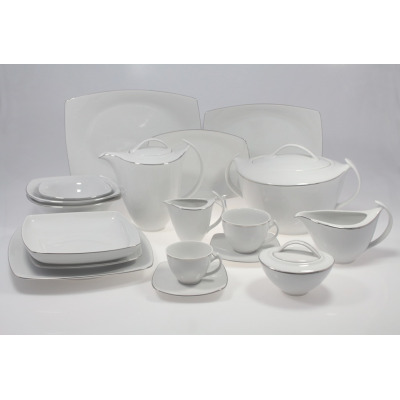 Serwis obiadowo-kawowy Chodzież 9718 AKCENT Platynowa linia dla 12 osób. Biała porcelana o nowoczesnym, kwadratowym kształcie z eleganckim, srebrnym zdobieniem.